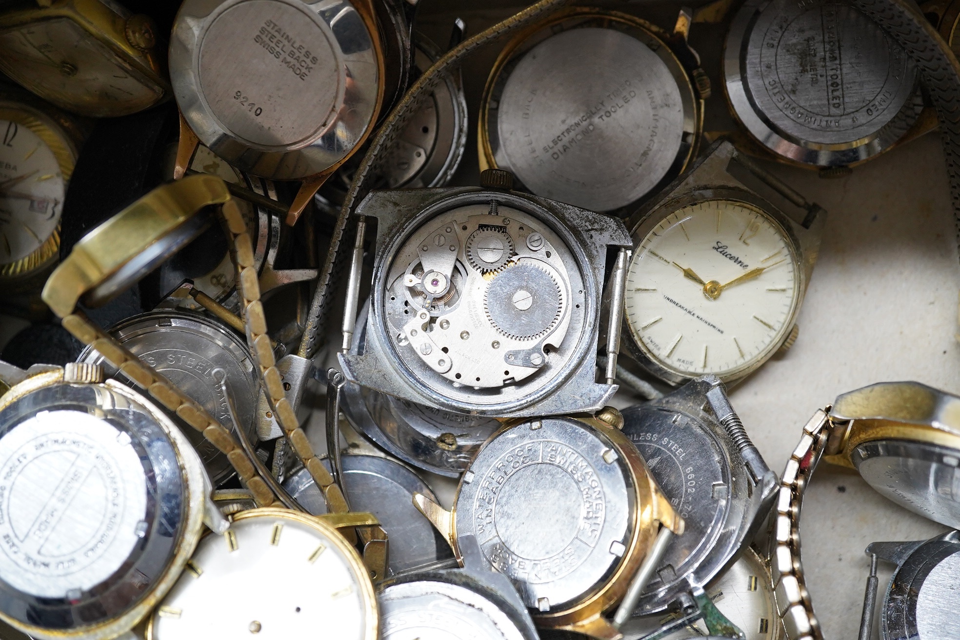 A large collection of assorted mainly gentleman's wrist and pocket watches, including Smiths, Oris and Ingersoll. Condition - poor to fair